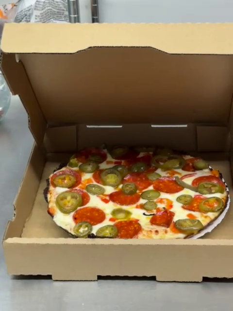 Platillo de Di Tu Cuban Pizzeria: Austin’s Domino & Pizza Hotspot