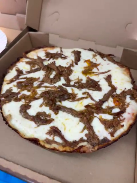 Platillo de Di Tu Cuban Pizzeria: Austin’s Domino & Pizza Hotspot